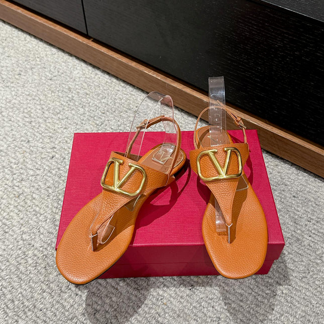 THONG SANDAL IN GINGER ORANGE CALFSKIN WITH GOLD LOGO