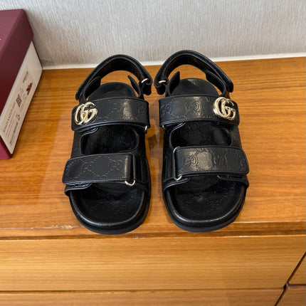 GG SANDALS S25 IN BLACK LAMBSKIN EMBOSSED LOGO WITH GOLD HARDWARE