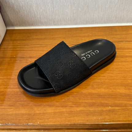 GG SLIDES IN BLACK SUEDE WITH EMBOSSED LOGO