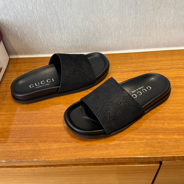 GG SLIDES IN BLACK SUEDE WITH EMBOSSED LOGO