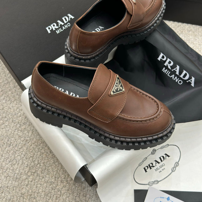PRADA 25S LOAFER 50MM IN DARK BROWN CALFSKIN LOGO