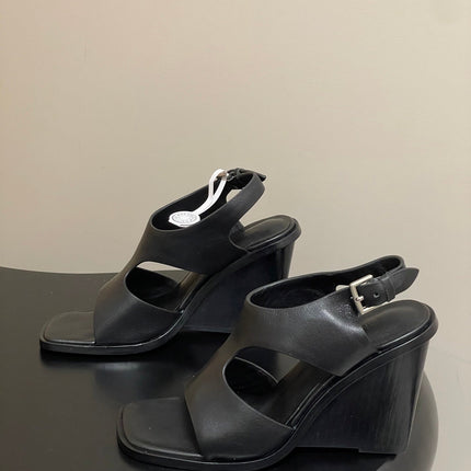 HM 25S KALYA WEDGE SANDAL 100 MM IN BLACK LAMBSKIN
