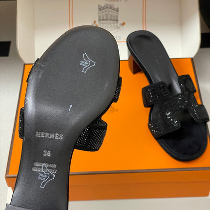HM 25S ORAN HIGH‑HEEL SANDAL 50 MM IN BLACK LAMBSKIN WITH STONE DETAILS