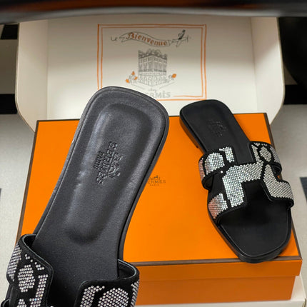 HM 25S ORAN SANDAL IN BLACK LAMBSKIN WITH WHITE STONE DETAILS