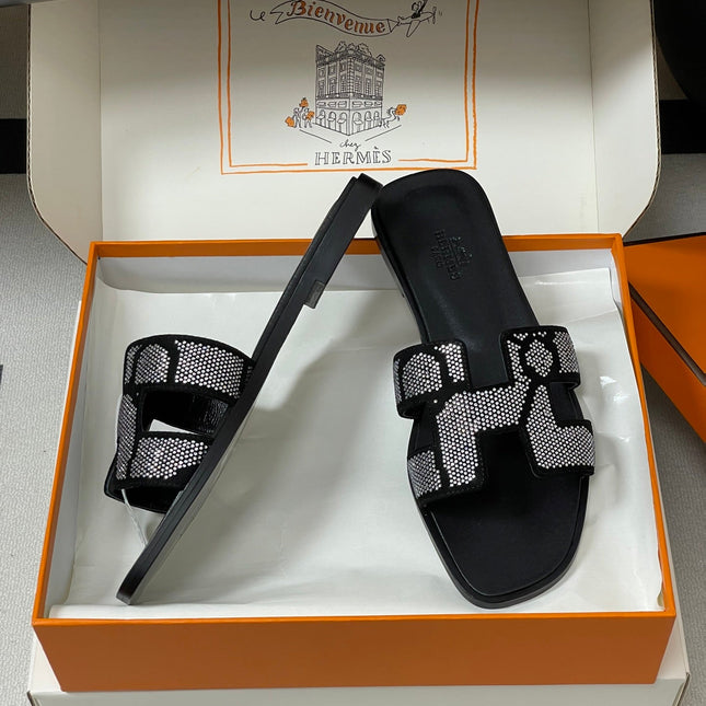 HM 25S ORAN SANDAL IN BLACK LAMBSKIN WITH WHITE STONE DETAILS