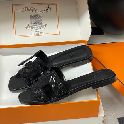 HM 25S ORAN SANDAL IN BLACK LAMBSKIN WITH STONE DETAILS