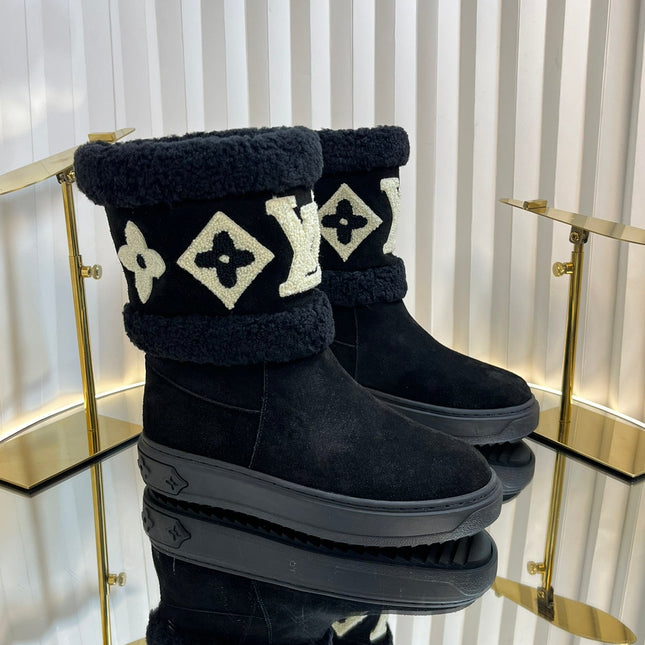 SNOWDROP FLAT ANKLE BOOTS IN BLACK SUEDE