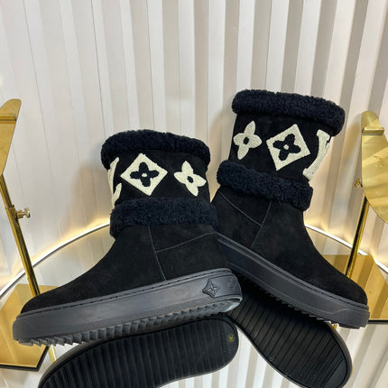 SNOWDROP FLAT ANKLE BOOTS IN BLACK SUEDE