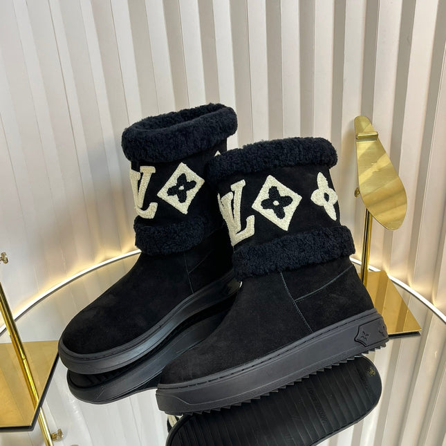 SNOWDROP FLAT ANKLE BOOTS IN BLACK SUEDE