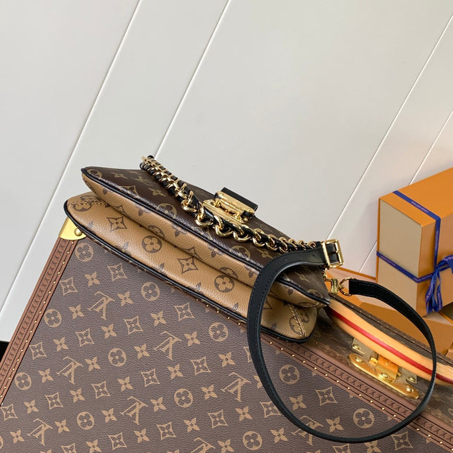 TWINNY BAG 29 IN BROWN MONOGRAM CANVAS AND CALFSKIN