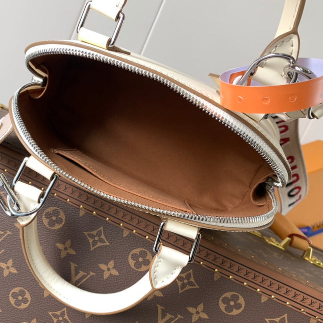 ALMA BB BAG 23 IN BEIGE GRAIN EPI COWHIDE