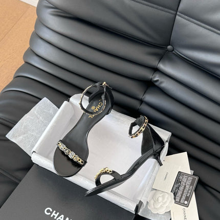 MID-HEEL 35 MM SANDAL IN BLACK SHEEPSKIN WITH STICKERS