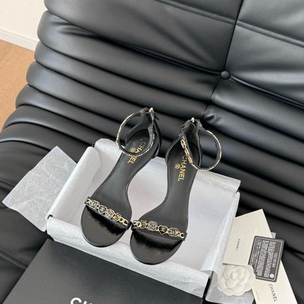 MID-HEEL 35 MM SANDAL IN BLACK SHEEPSKIN WITH STICKERS