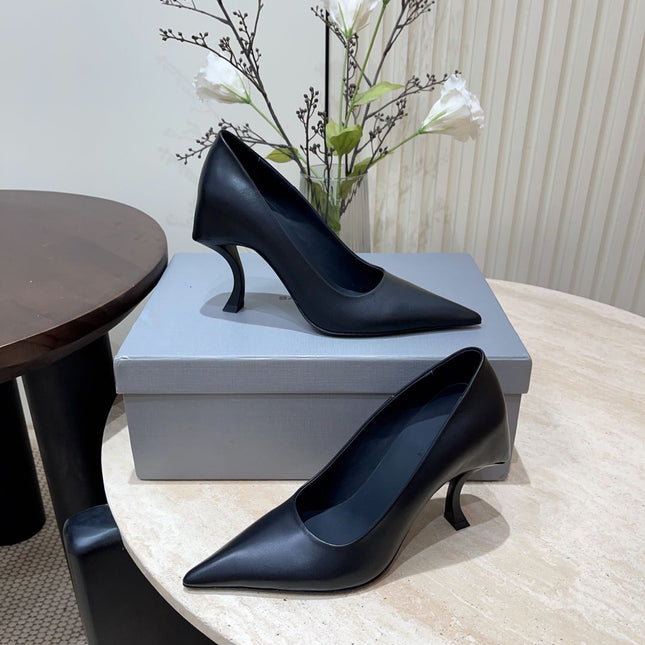 CURVED HEEL SHALLOW MOUTH PUMPS IN BLACK CALFSKIN