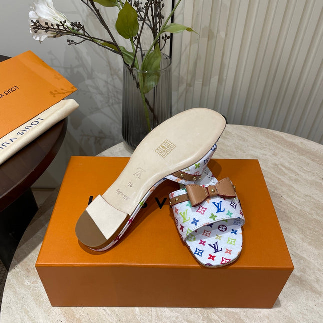 FLAT MULES IN WHITE MONOGRAM LAMBSKIN