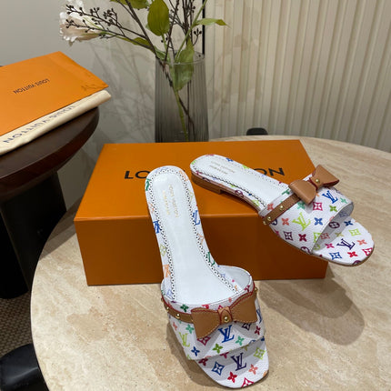 FLAT MULES IN WHITE MONOGRAM LAMBSKIN