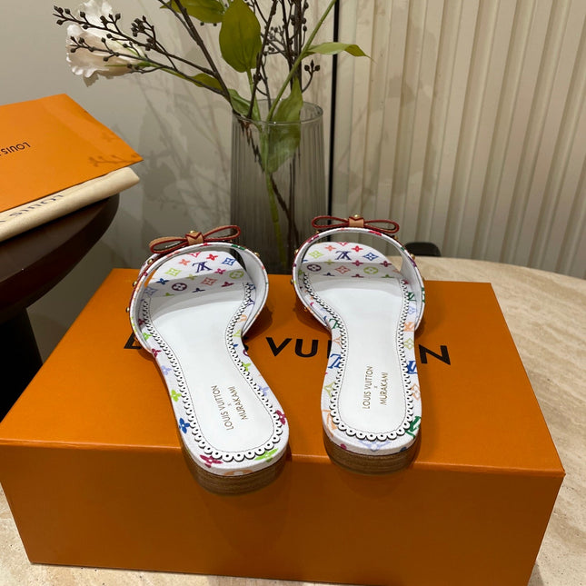 FLAT MULES IN WHITE MONOGRAM LAMBSKIN