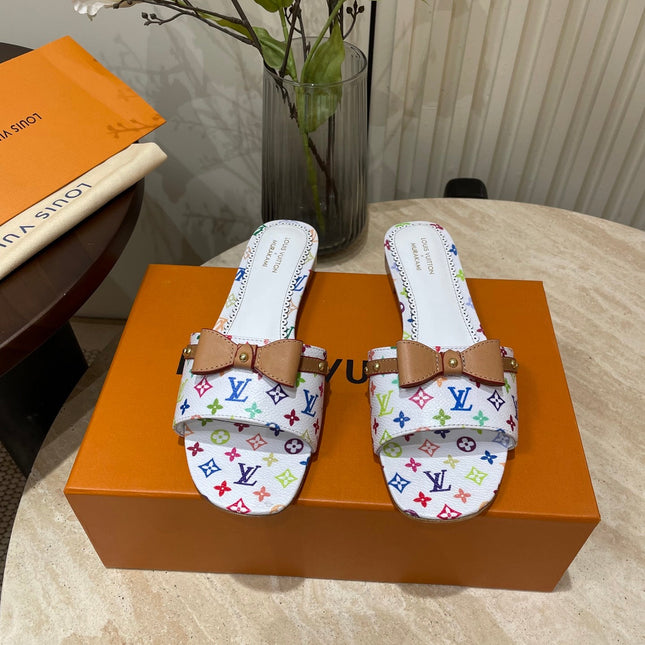FLAT MULES IN WHITE MONOGRAM LAMBSKIN