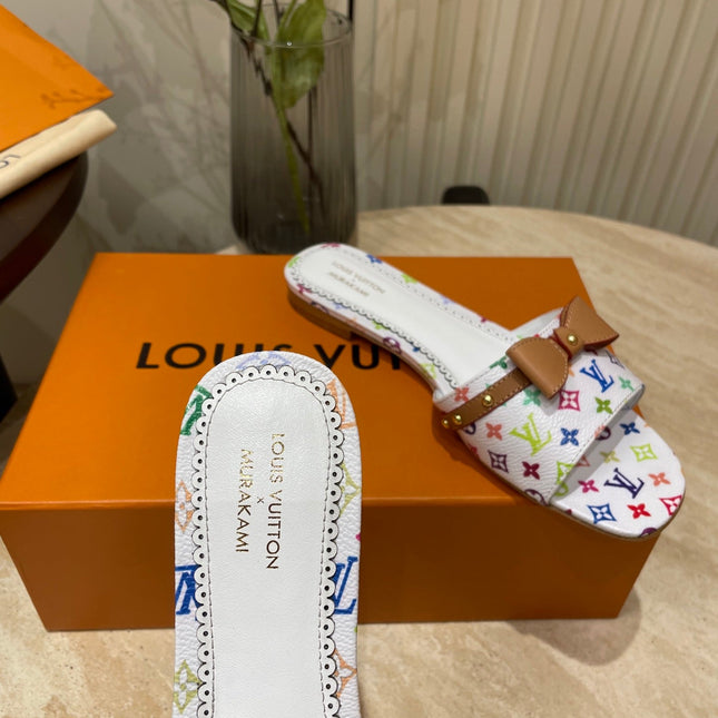 FLAT MULES IN WHITE MONOGRAM LAMBSKIN