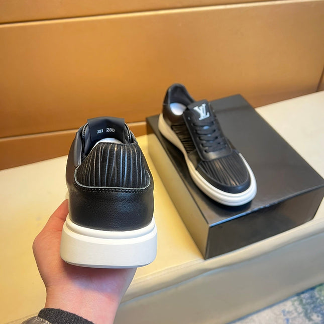 LV SNEAKERS IN BLACK CALFSKIN AND SUEDE