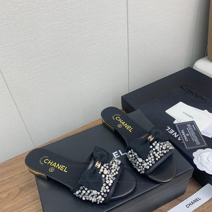 BOW SLIPPERS IN BLACK LAMBSKIN WITH RHINESTONES