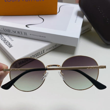 SIGNATURE ROUND SUNGLASS 581381 IN GOLD METAL GREY SMOKE LENSES