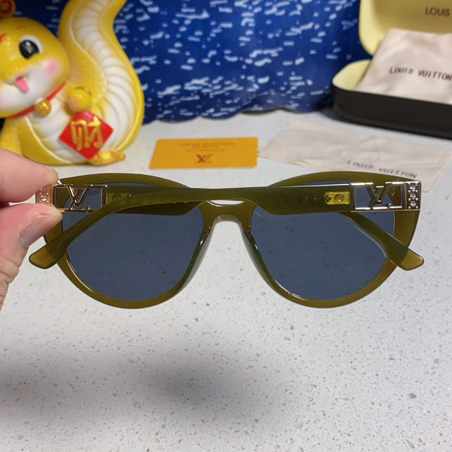 CAT EYE SUNGLASSES 567469 IN GREEN CLEAR ACETATE
