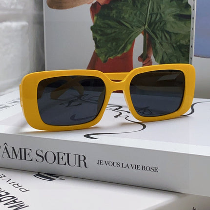 MONTAIGNE SUNGLASS 571593 IN YELLOW ACETATE TEXT LOGO