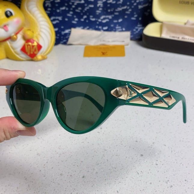 CAT EYE SUNGLASSES 576882 IN GREEN AND GOLD ACETATE