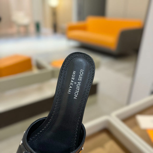 LV X TM 6AM FLAT MULE IN BLACK CALFSKIN