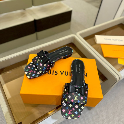 LV X TM 6AM FLAT MULE IN BLACK MONOGRAM CALFSKIN