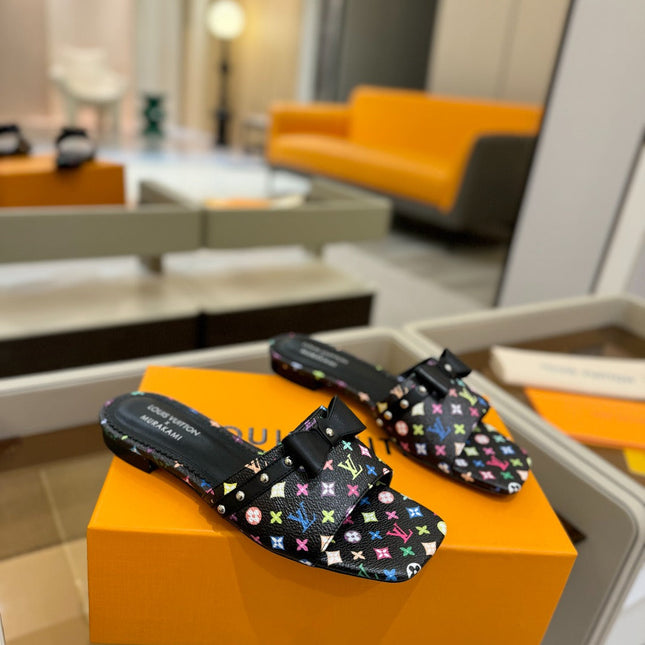 LV X TM 6AM FLAT MULE IN BLACK MONOGRAM CALFSKIN