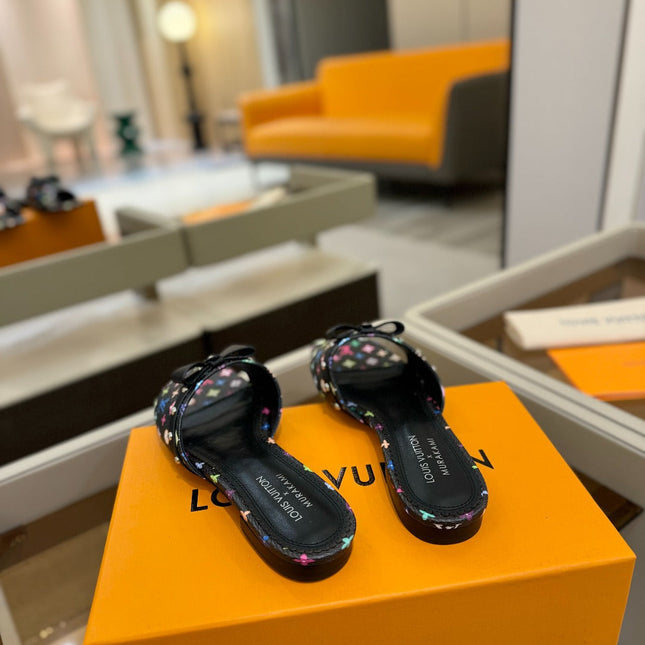 LV X TM 6AM FLAT MULE IN BLACK MONOGRAM CALFSKIN