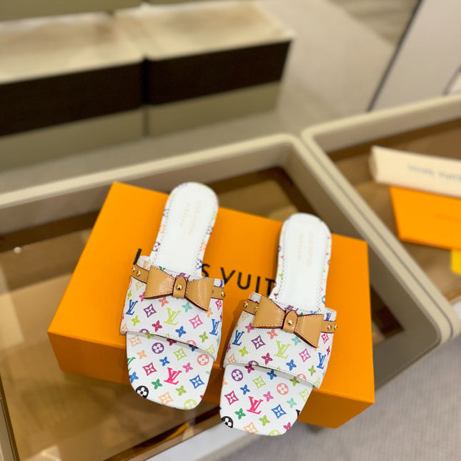 LV X TM 6AM FLAT MULE IN WHITE MONOGRAM CALFSKIN