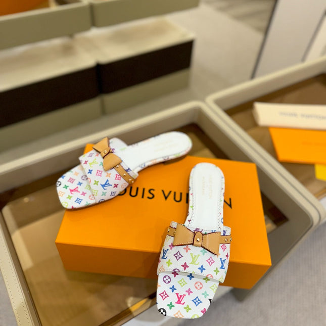 LV X TM 6AM FLAT MULE IN WHITE MONOGRAM CALFSKIN