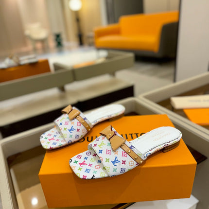 LV X TM 6AM FLAT MULE IN WHITE MONOGRAM CALFSKIN