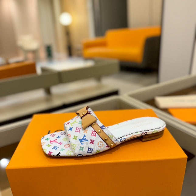 LV X TM 6AM FLAT MULE IN WHITE MONOGRAM CALFSKIN
