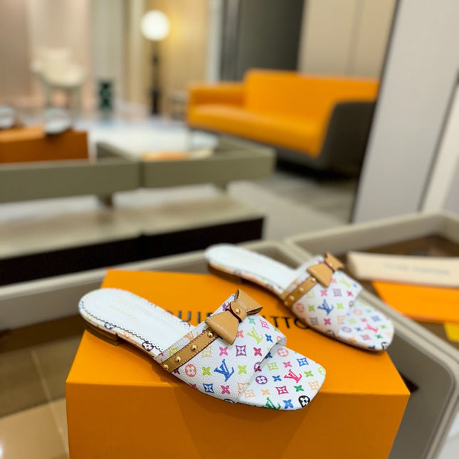LV X TM 6AM FLAT MULE IN WHITE MONOGRAM CALFSKIN
