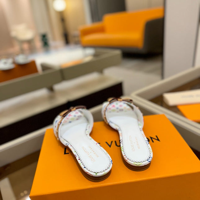 LV X TM 6AM FLAT MULE IN WHITE MONOGRAM CALFSKIN