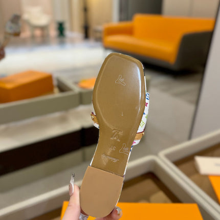 LV X TM 6AM FLAT MULE IN WHITE MONOGRAM CALFSKIN