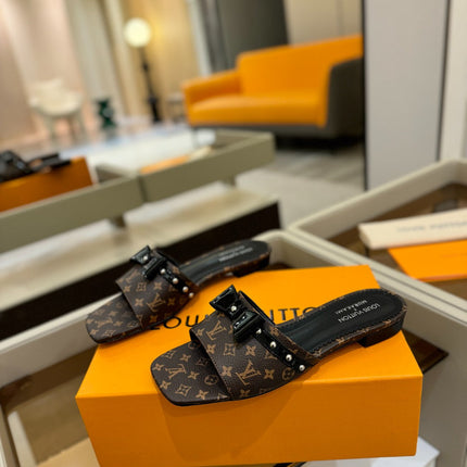 LV X TM 6AM FLAT MULE IN CHOCOLATE BROWN MONOGRAM CALFSKIN