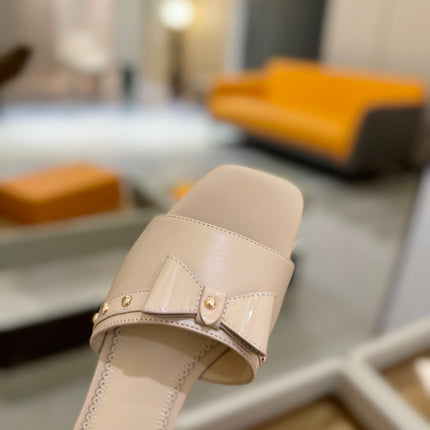 LV X TM 6AM FLAT MULE IN LINEN TAN CALFSKIN