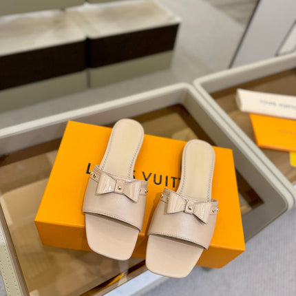 LV X TM 6AM FLAT MULE IN LINEN TAN CALFSKIN