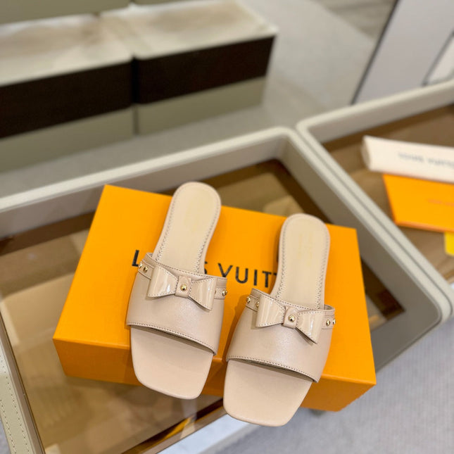 LV X TM 6AM FLAT MULE IN LINEN TAN CALFSKIN