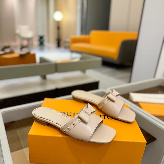 LV X TM 6AM FLAT MULE IN LINEN TAN CALFSKIN