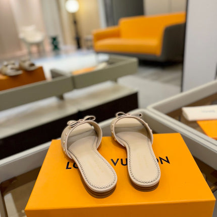 LV X TM 6AM FLAT MULE IN LINEN TAN CALFSKIN