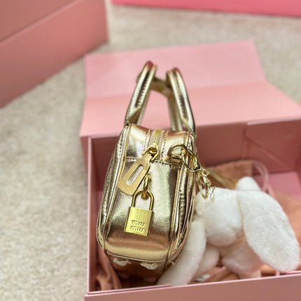 BOWLING BAG 21 IN GOLD LAMBSKIN