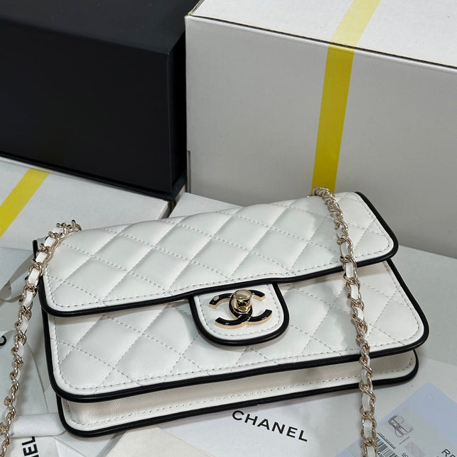 QUILTED FLAP BAG WITH BLACK TRIM 19 IN WHITE LAMBSKIN