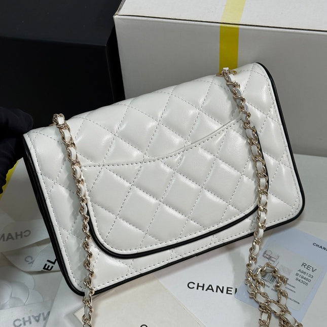 QUILTED FLAP BAG WITH BLACK TRIM 19 IN WHITE LAMBSKIN