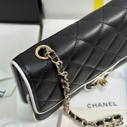 QUILTED FLAP BAG WITH WHITE TRIM 19 IN BLACK LAMBSKIN